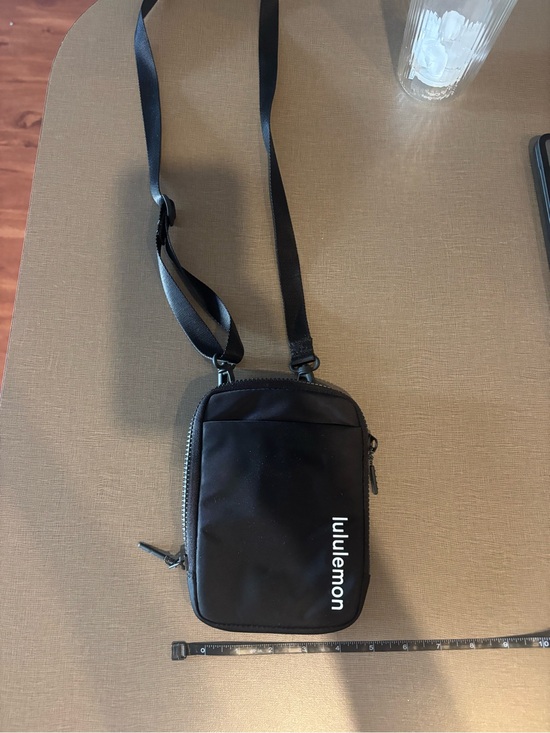 lululemon athletica Handbags - lululemon athletica Black Crossbody Pouch with White Logo